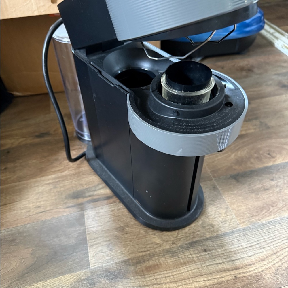 Nespresso Black and Gray Coffee Maker and frother